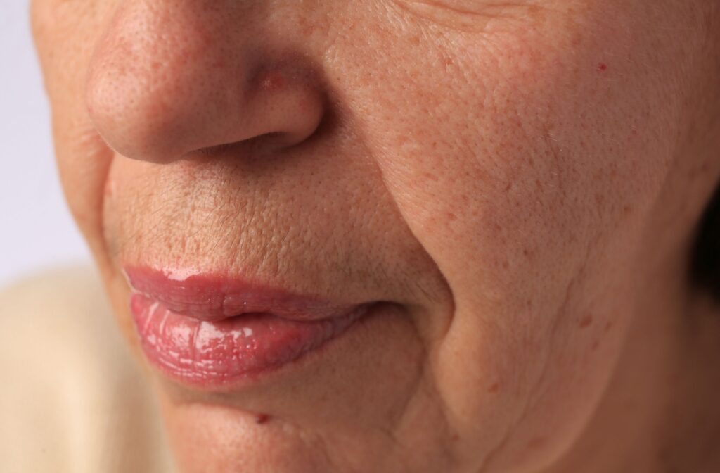 A close-up image of an older adult with marionette and smile lines.